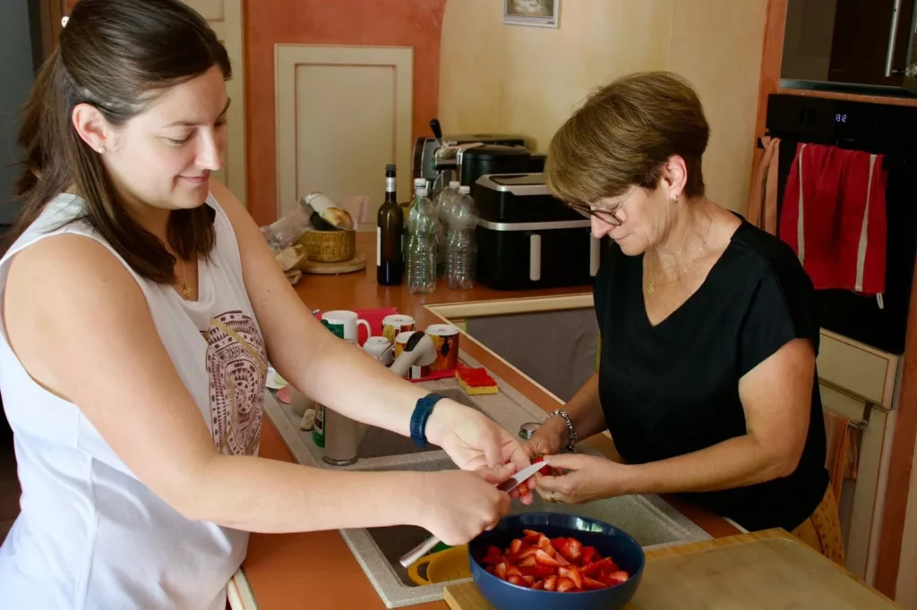 Cooking workshop in the kitchen with Marie during the French immersion homestay