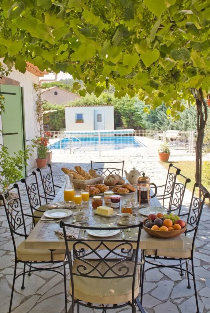 Provençal breakfast served on the terrace during a French immersion homestay in Fayence, Provence