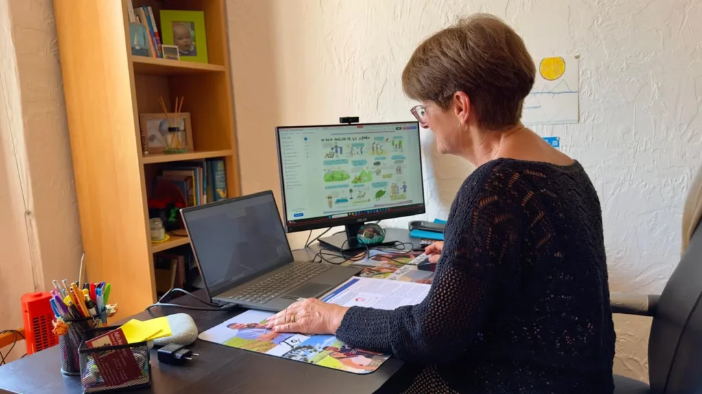 Online French lesson by video call, teaching material on screen
