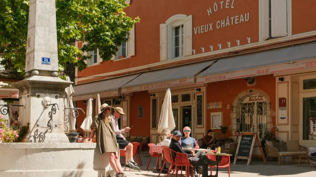 Café terrace on the village square of Aiguines, in Provence